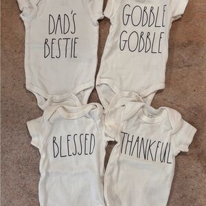 Set of six Rae Dunn onesies 0-3m